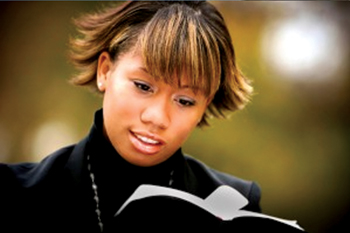 Woman reading a Bible