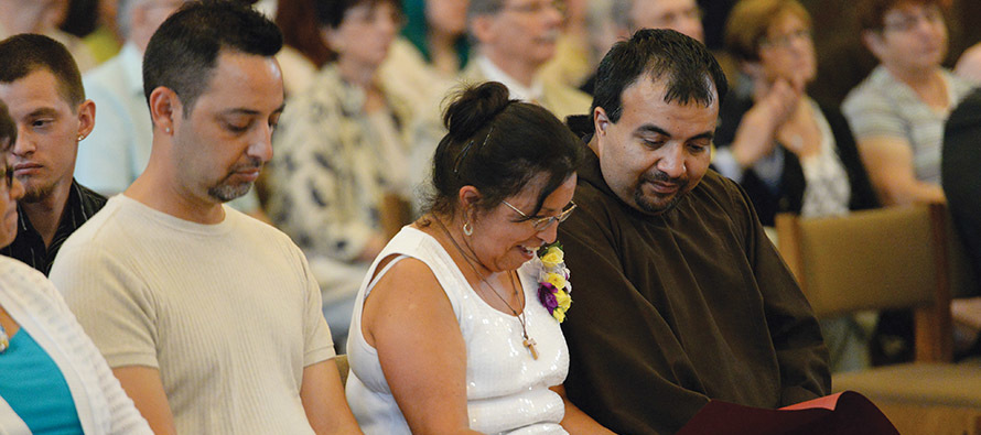 Friar Vito Martinez, O.F.M.Cap. shares a smile with his mother, Guadalupe Martinez, at his final vows ceremony