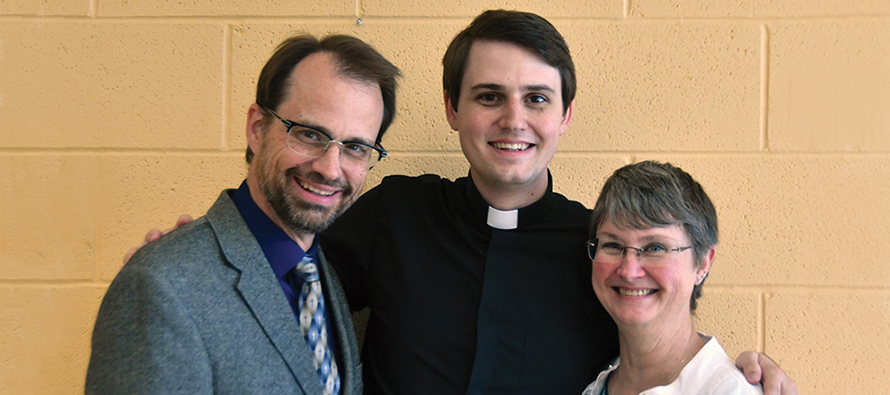 Kevin and Kit Cummings, the parents of Father Evan Cummings, C.S.P., with their son